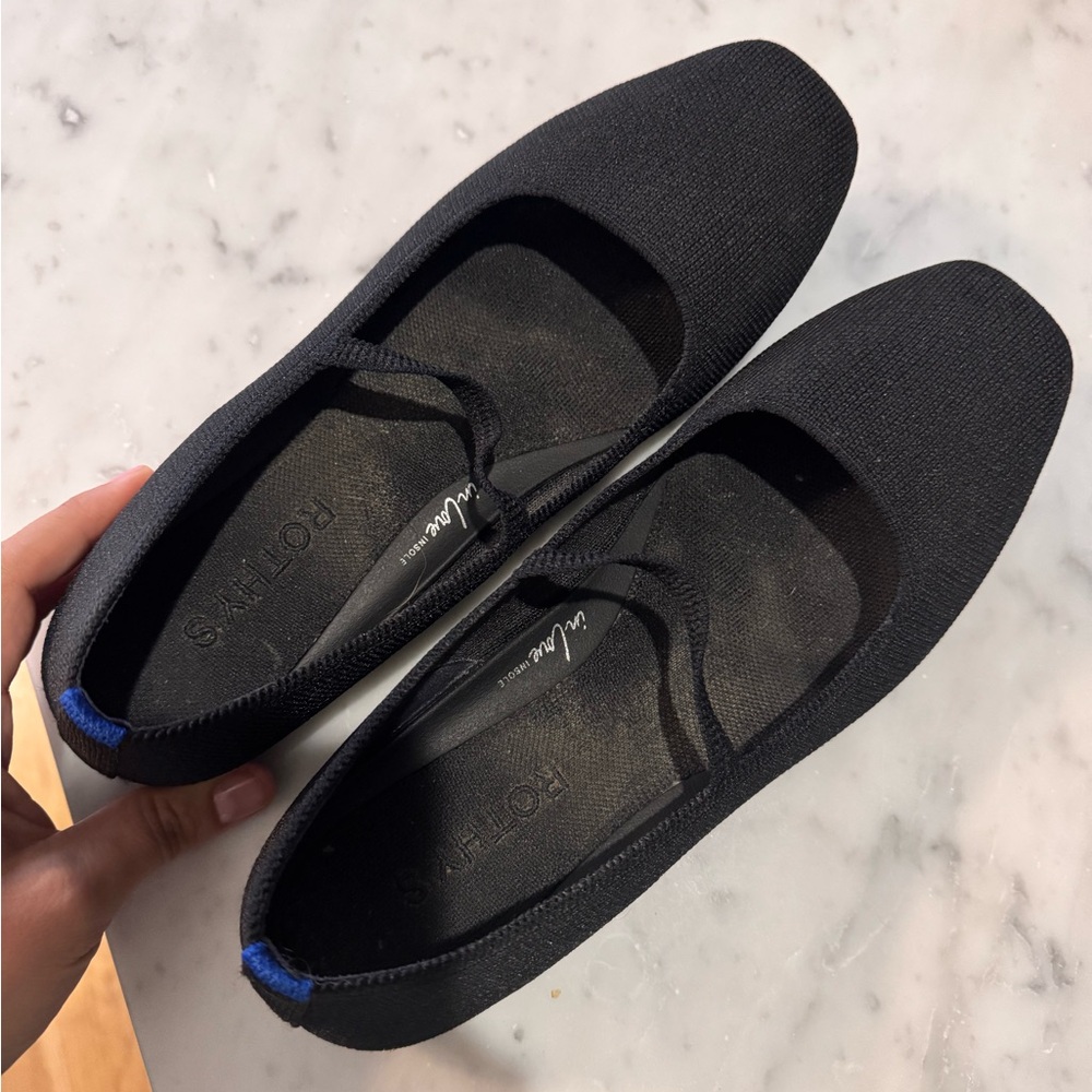 Rothy's Elegant Black Flats with Blue Detail